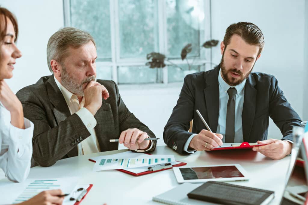 business people working together 2 scaled